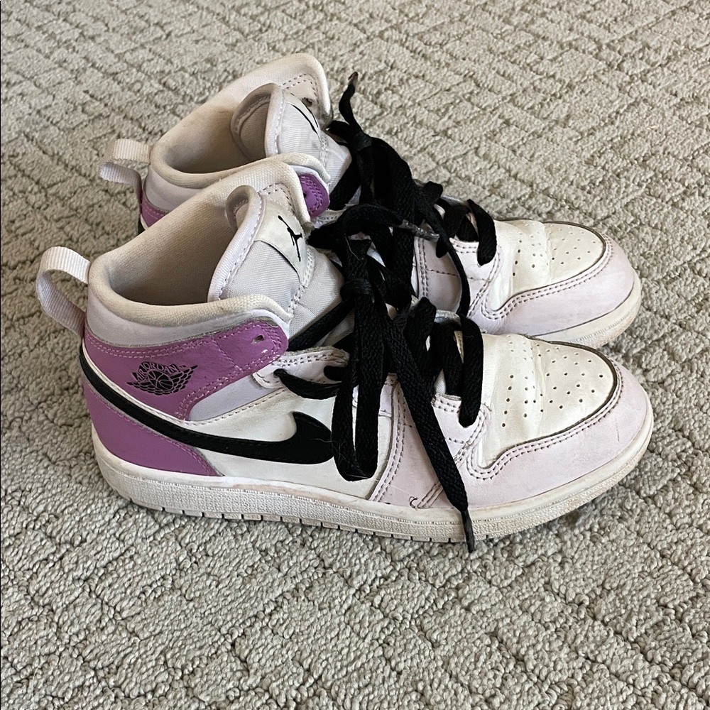 Kid’s Nike Air Jordan mid 1 in Purple, White, and Black
